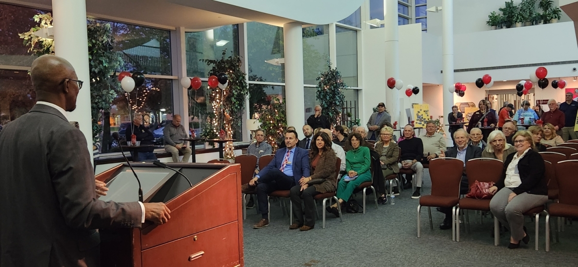 Kojo Quartey speaking to the crowd