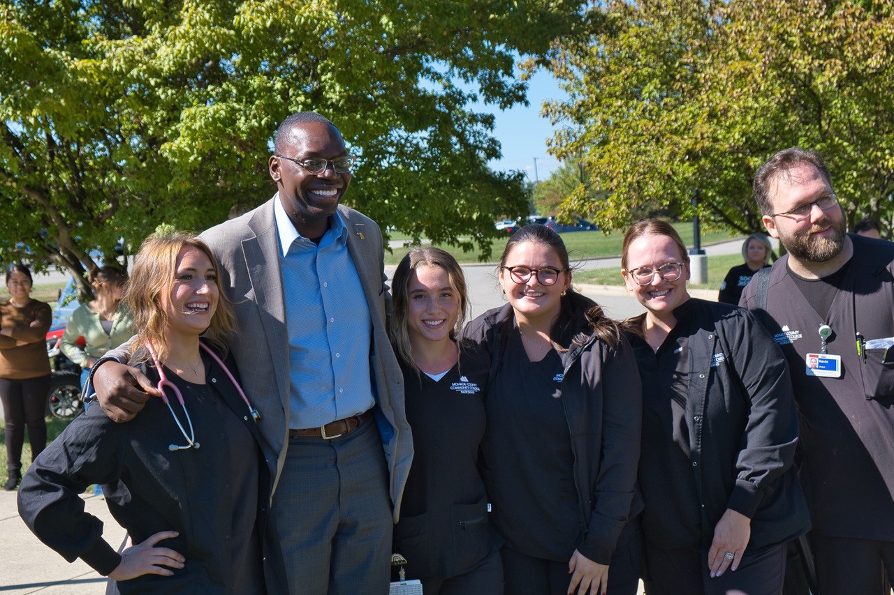 MCCC nursing students pose with Lt. Gov. Garlin Gilchrist II at the groundbreaking ceremony.