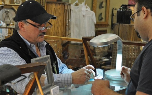 Antique seller and customer