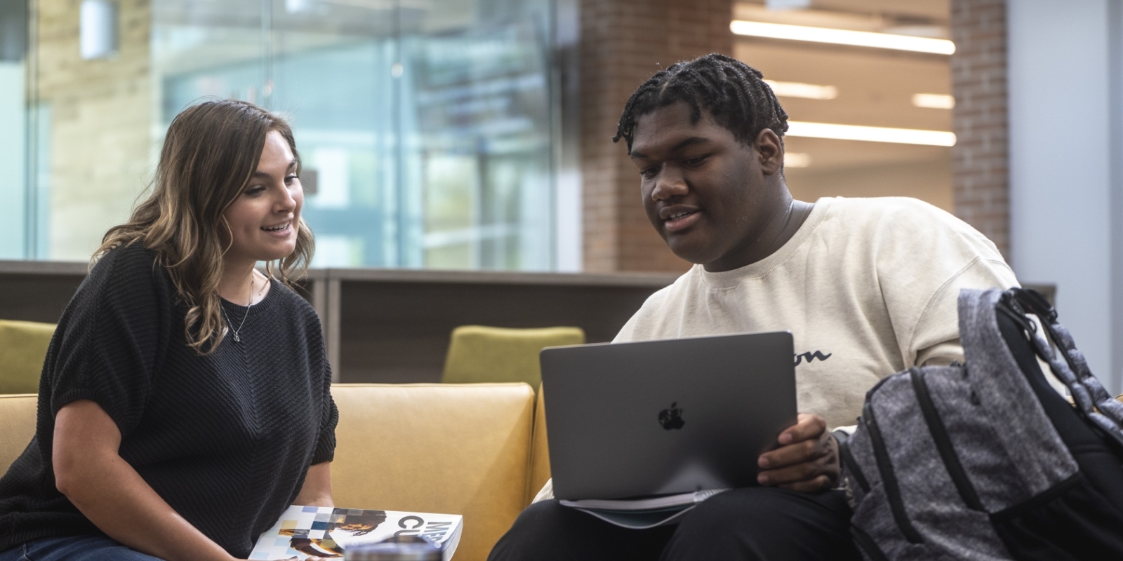 Two students in Founders Hall