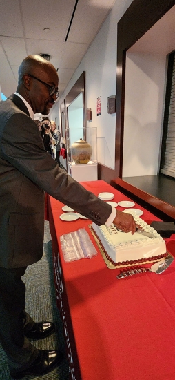 Kojo cutting cake